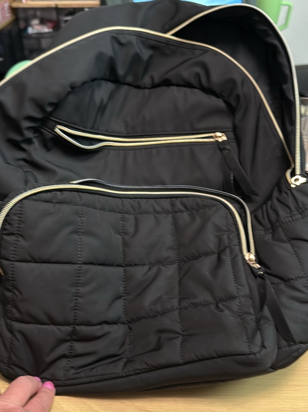 Quilted Black Backpack with Gold Zippers